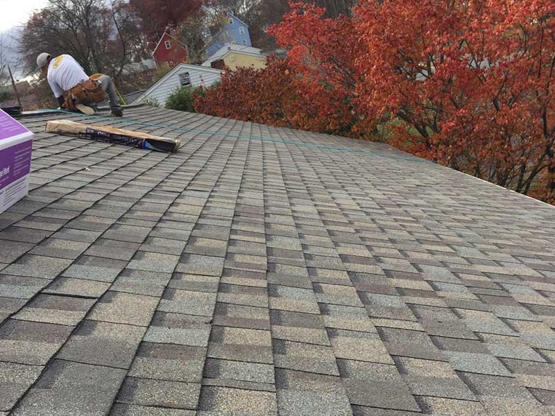 damaged shingles - how often should a roof be replaced